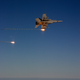 Flares over Afghanistan, note one bomb had already been dropped.